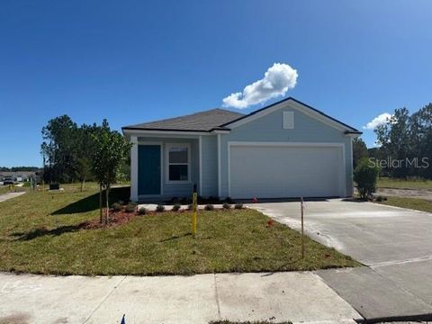 Photo of 1 Mulligan Way, Bunnell, FL 32110 (MLS # FC312855) Photo of 1 Mulligan Way, Bunnell, FL 32110 (MLS # FC312855)