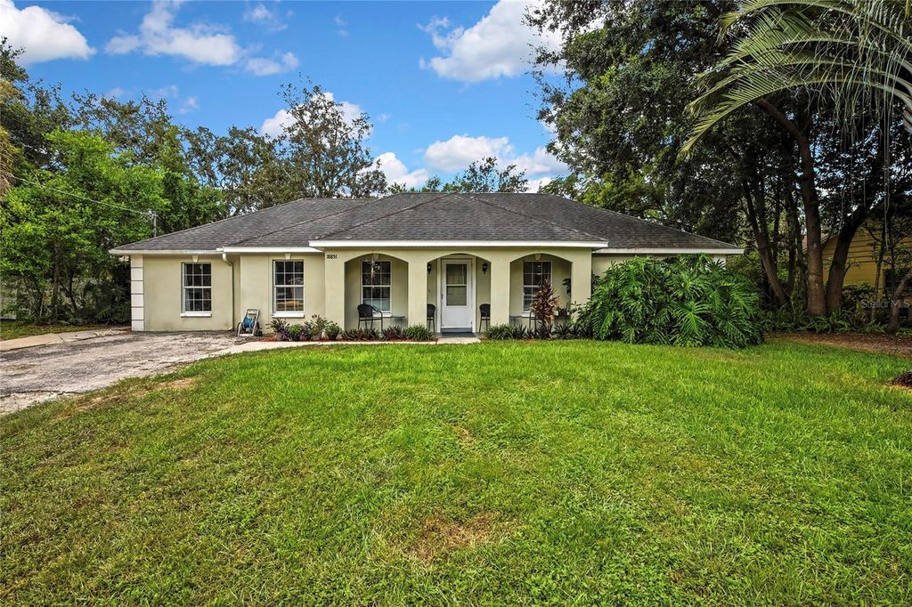 Photo of 18851 Tracer Drive, Lutz, FL 33549 (MLS # TB8414138)