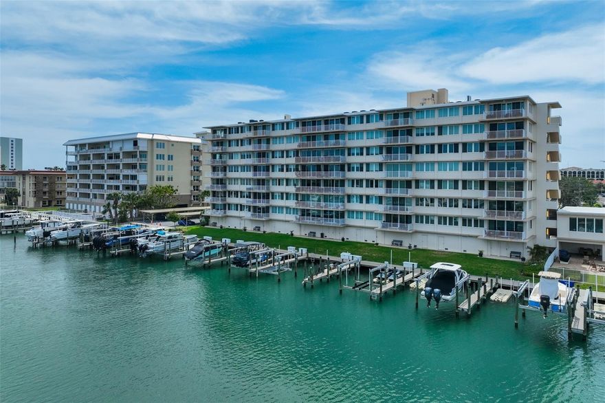 Live the coastal lifestyle you’ve been dreaming of in this beautifully maintained 2-bedroom, 2-bath UNFURNISHED condominium located in the highly desirable Island Estates community. Situated on the 5th floor with side tranquil Intracoastal Waterway views, this residence offers fabulous waterfront living with two private balconies that invite in natural light and refreshing island breezes.    The open concept floor plan seamlessly connects the living, dining, and kitchen areas, ideal for both everyday living and entertaining. Expansive windows throughout the home flood the space with natural light. The kitchen is well appointed with granite countertops, a breakfast bar, and ample cabinetry.    The oversized primary suite is a true retreat, featuring its own private balcony, a very spacious walk-in closet, and an en-suite bathroom. The second bedroom is perfect for guests and can easily function as a home office or flex space.    Renters enjoy resort-style amenities including a waterfront pool, clubhouse, and fitness room. For boating enthusiasts, a private boat slip is available for sale or rent, offering convenient access to the open waters.    Ideally located within walking distance to the Clearwater Marine Aquarium, nearby restaurants, and local conveniences, and just minutes from world-famous Clearwater Beach, this property offers the perfect balance of island serenity and everyday accessibility.    Whether you’re seeking a primary residence, vacation retreat, or investment opportunity, this Island Estates condo delivers lifestyle, comfort, and exceptional coastal appeal.    Schedule your private showing today.