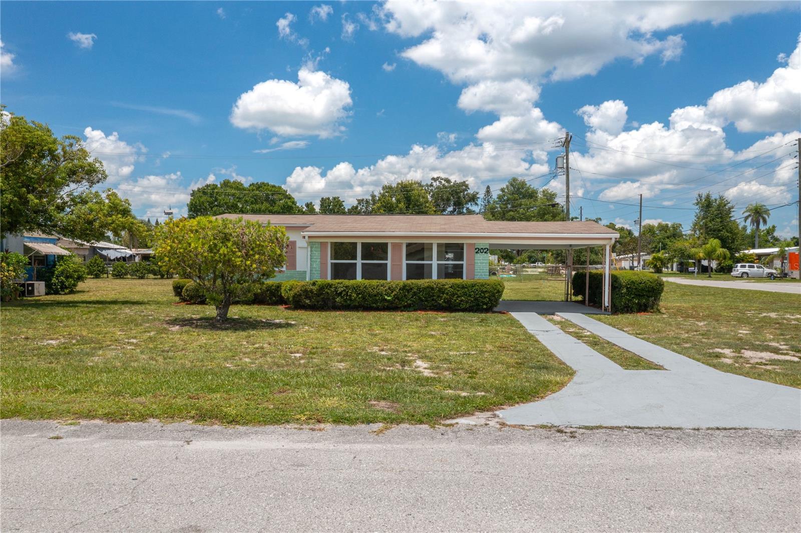 Welcome to this beautifully updated 2-bedroom, 1-bathroom block home located on a corner lot in the Sun Ray community of Frostproof, Florida. With fresh interior and exterior paint and brand-new luxury vinyl plank flooring throughout, this home is move-in ready and full of charm. Enjoy peace of mind with recent major updates, including a new AC system installed in 2024 and a brand-new septic drain field completed in January 2025. The kitchen and bathroom have both been recently refreshed, offering a clean and modern feel. Additional features include an inside laundry room for convenience, a one-car carport, and an outdoor storage shed for your tools or hobbies. Situated just off Highway 27, this property provides easy access for commuting to nearby towns and attractions. Whether you're a first-time homebuyer, downsizing, or looking for an investment opportunity, this well-maintained home is a must-see! Schedule your showing today!