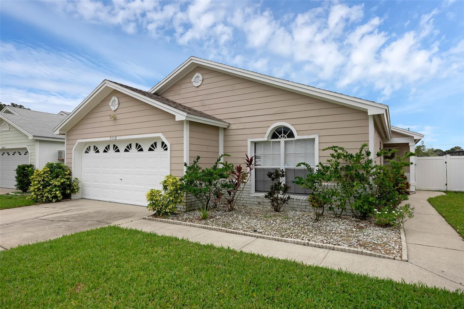 Fantastic Opportunity at a fantastic price! Take advantage of this ready to move in home with no HOA fees. 3 bedroom 2 bath split floor plan features an updated kitchen with white shaker cabinets, tile backsplash complimented by a stainless steel appliance package. Vaulted ceilings, modern lighting fixtures along with all tile flooring and no carpet. Master bedroom offers a double sink granite vanity along with a walk in shower with designer tile floor to ceiling plus a spacious walk in closet. Hall bath also offers a granite vanity with updated accessories. Exterior features a screen enclosed covered patio overlooking a huge fenced in backyard. All situated on a cul-de-sac. Community features a centerpiece pak with pool , playground and tennis courts. Location benefits include less than 15 minutes DIsney, easy access to SR 429, I4, FLorida Turnpike along with plenty of restaurants, shopping and golf courses.