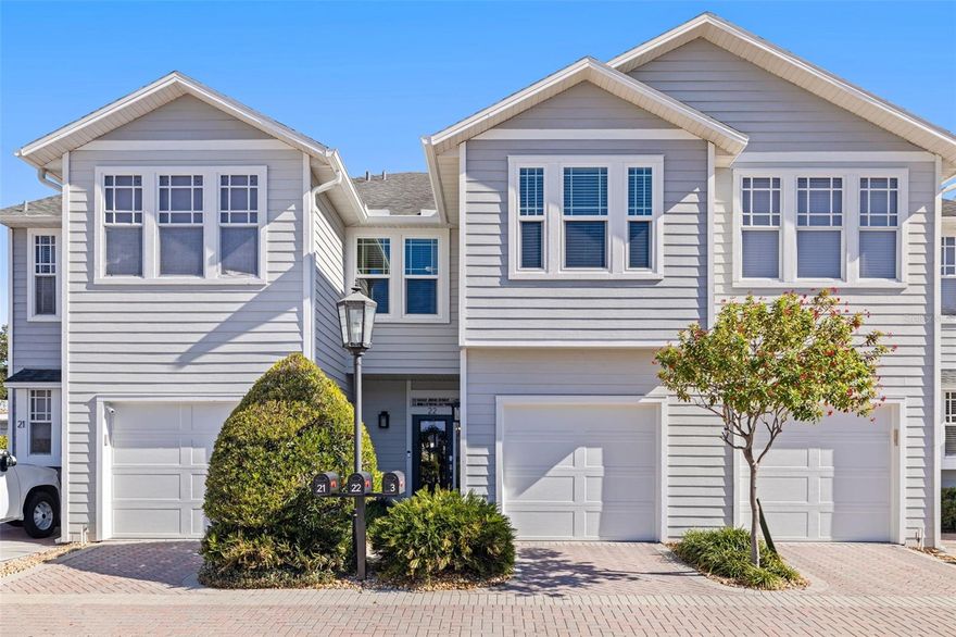 Located within the gated enclave of Village Gate in Hyde Park, this beautiful residence offers a rare combination of privacy, scale, and walkability in one of South Tampa's most sought-after settings, not in a flood zone. With only 29 residences, the community features paver-lined streets and a private pool and cabana exclusively for residents. The interior presents an open floor plan with gorgeous wood floors and a cohesive flow among the kitchen, dining, and living areas. The kitchen includes custom cabinetry, granite countertops, stainless steel appliances, and a gas range. The living room features a gas fireplace and opens through French doors to a private fenced outdoor living space. The second level includes a spacious primary suite with an en-suite spa-like bath, soaking tub, walk-in shower, and generous closet space. Two additional bedrooms, a full bath, laundry, and abundant storage complete the upstairs layout. Recent upgrades include hurricane-impact windows, a tankless gas water heater, and an updated HVAC system. Located just minutes from Hyde Park Village, downtown Tampa, and some of the city's most celebrated dining, including Bern's Steak House, within a short distance. This residence delivers the best of South Tampa living within a secure, boutique setting rarely available.