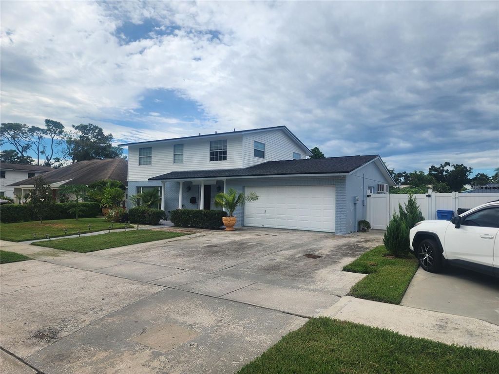 Photo of 7715 W Pocahontas Avenue, Tampa, FL 33615 (MLS # TB8425359)