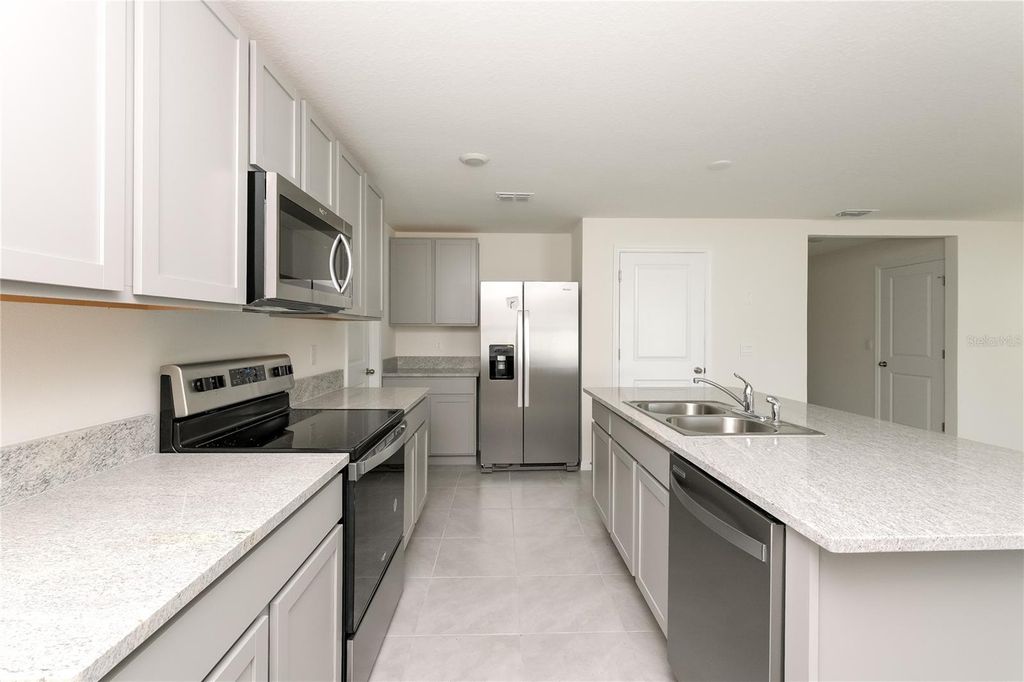 Photo of 486 Sunlit Coral Street, Ruskin, FL 33570 (MLS # TB8480332)