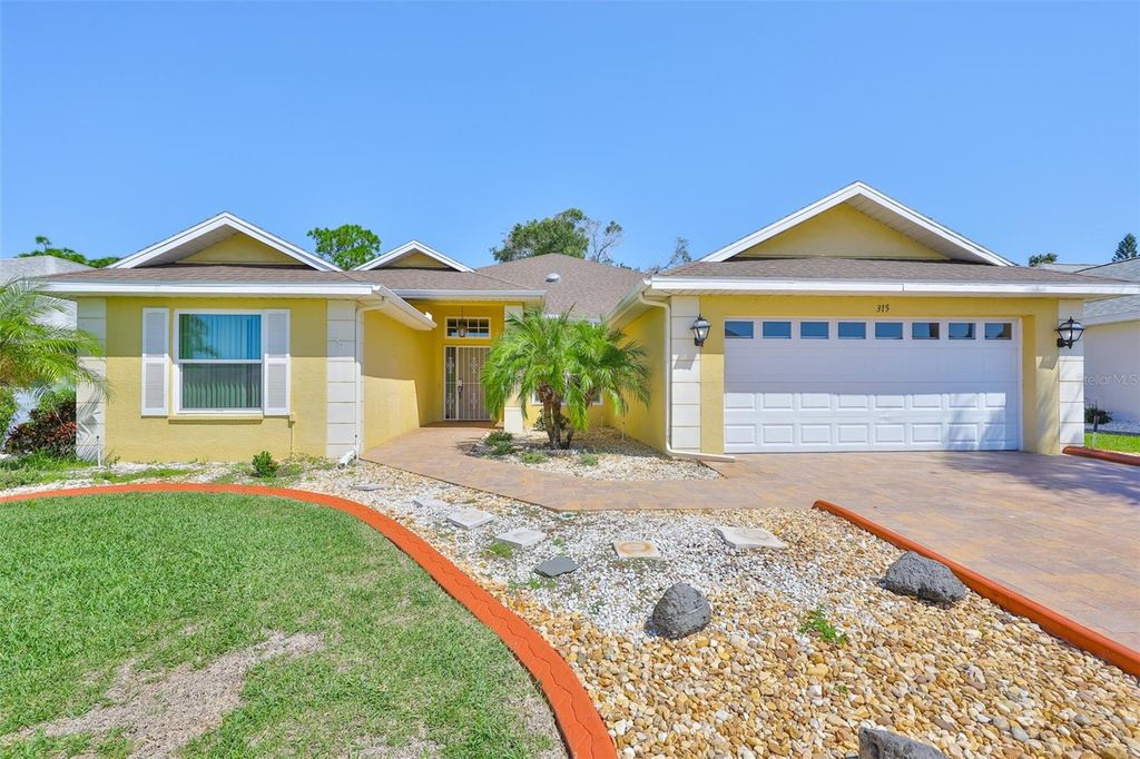 Photo of 315 Caloosa Woods Lane, Sun City Center, FL 33573 (MLS # TB8430145)