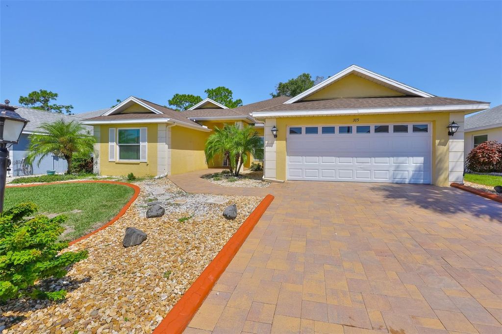 Photo of 315 Caloosa Woods Lane, Sun City Center, FL 33573 (MLS # TB8430145)