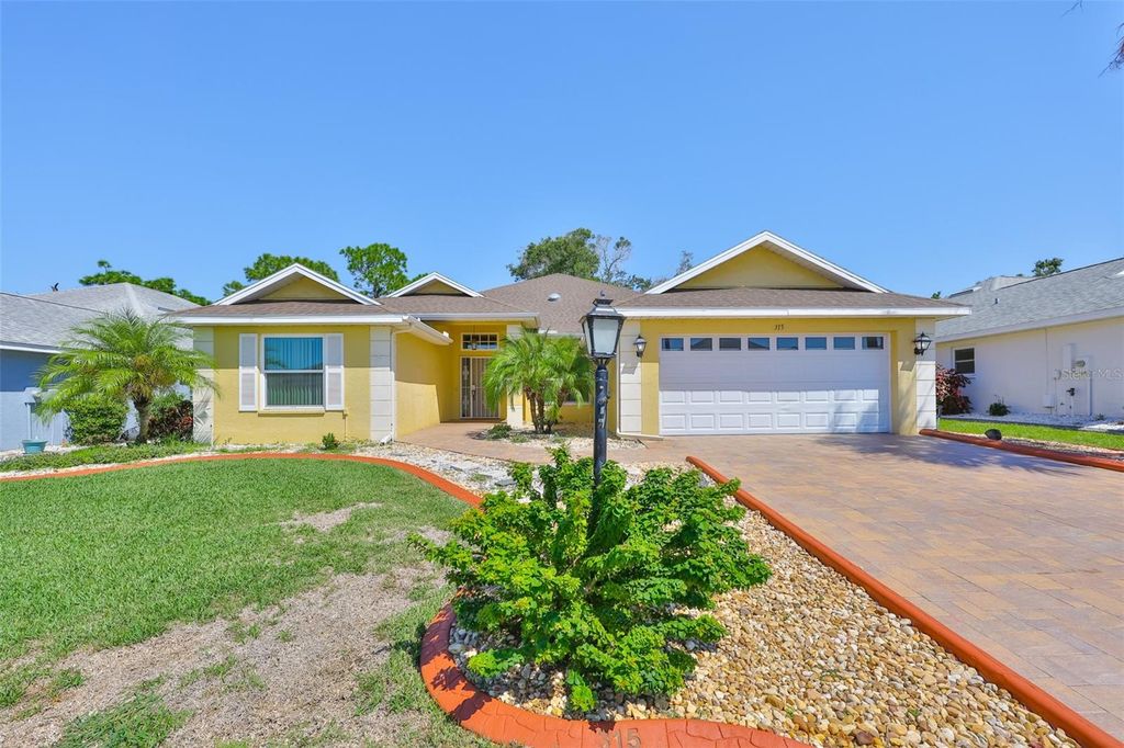 Photo of 315 Caloosa Woods Lane, Sun City Center, FL 33573 (MLS # TB8430145)