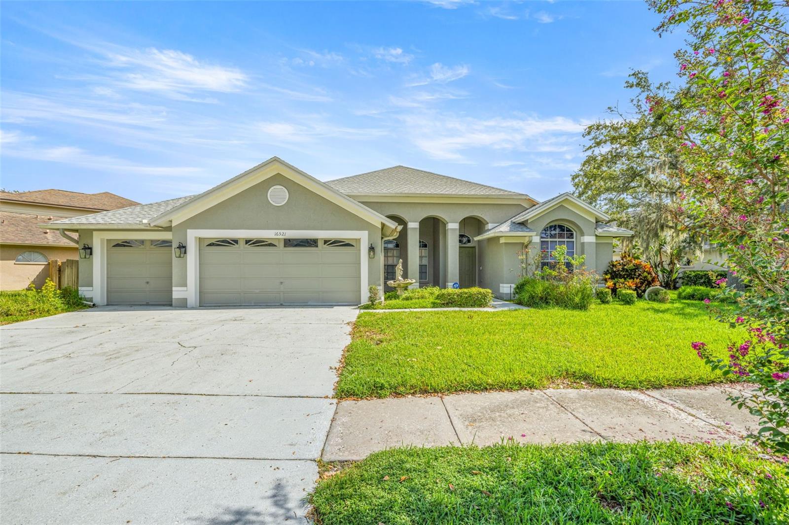 Welcome to Lake Heather! This beautifully maintained home offers just over 2,000 square feet in one of North Tampa’s most desirable communities. Step inside to an open split floor plan filled with plenty of natural light, large windows and high ceilings.
The primary suite includes a walk in closet, en suite bathroom, and a private office for work or quiet time. Two additional bedrooms provide space for family, guests, or hobbies. The kitchen features granite countertops, stainless steel appliances, and a breakfast bar that flows into the living areas for easy entertaining.
The primary suite is spacious and private, featuring dual closets, an en suite bathroom, and a separate office that adds flexibility for working from home or creating your own quiet space. Two additional bedrooms provide room for family, guests, or hobbies. The kitchen is equipped with granite countertops, stainless steel appliances, and a breakfast bar that connects to the living and dining areas for easy entertaining.
Sliding glass doors lead to a covered lanai where you can relax with morning coffee or unwind at sunset while overlooking the water. The fenced backyard is perfect for gatherings, play, or simply enjoying the serenity of lakeside living. A three car garage offers plenty of storage and parking.
Located in the sought-after Carrollton Lakes community, this home gives you the best of both worlds - a scenic lakefront setting with convenient access to shopping, dining, top rated schools, and major highways.