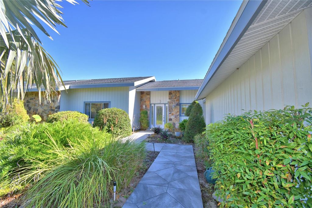 Photo of 48 Nottingham Way, Haines City, FL 33844 (MLS # O6361366)