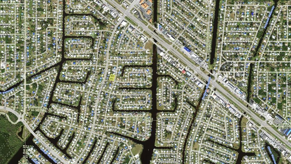 Photo of 196 Deerfield Avenue NE, Port Charlotte, FL 33952 (MLS # A4636062)