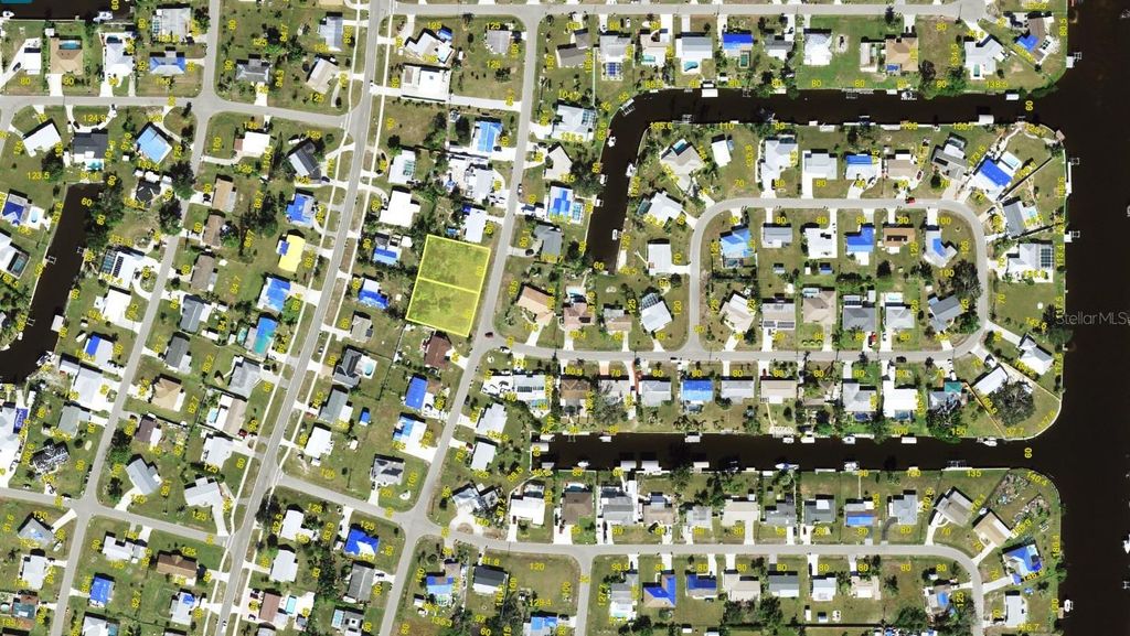 Photo of 196 Deerfield Avenue NE, Port Charlotte, FL 33952 (MLS # A4636062)