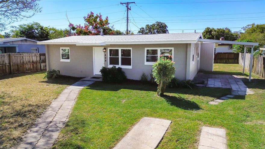 This is a must see! Fully renovated, beautiful 1,088 square foot block home on a large lot in desirable Sanford location with fenced backyard. This 3 bedroom, 2 bathroom home has been fully remodeled and is in turn-key condition. Enjoy the spacious new kitchen with solid wood cabinets, modern hardware, new stainless steel appliances, new sink and faucet, plenty of (marble) counter space and built-in pantry. The interior is freshly painted in neutral grey tones which compliment the beautiful wood-look flooring, new baseboards and new light fixtures throughout. Home boasts newer roof, new electrical panel, new air conditioner and ductwork, new water heater, new front door, new interior six panel doors, new windows throughout, fresh paint inside and out, remodeled kitchen, new stainless steel appliances, remodeled bathrooms, new wood-look tile throughout, new baseboards, new light fixtures throughout and carport (12x11). This home is centrally located right off Sanford Avenue in the heart of Sanford. No hoa. Come see for yourself. Check out 3D Tour in the Virtual Tour Link.