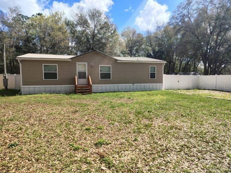 Beautifully Updated 3-Bedroom, 2-Bath Home in a Prime Ocala Location!

This stunning 1996 mobile home has been moved and is truly move-in ready, offering a fresh, like-new feel throughout. VA eligible, this home features 3 spacious bedrooms and 2 full bathrooms, providing the perfect blend of comfort and functionality.

Step inside to an open-concept living space filled with natural light, complemented by a beautifully updated kitchen showcasing granite countertops, modern cabinetry, and plenty of prep space—perfect for both everyday living and entertaining. The primary suite offers a peaceful retreat with a large walk-in closet and ample room to unwind.

Enjoy peace of mind with major updates already completed, including a new HVAC system (2021), well and septic (2021), hot water heater (2021), and a durable metal roof.

Outside, you’ll find a generously sized, fully fenced backyard—ideal for pets, gatherings, or simply relaxing in your own private space.

Conveniently located near shopping, dining, and everyday amenities, this home offers the perfect balance of quiet living with easy access to everything Ocala has to offer.

Don’t miss your chance to own this beautifully maintained home—schedule your showing today! *Owner Financng & Special Financing Available as low as 5% down