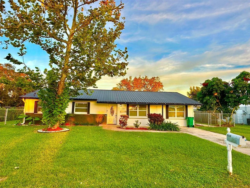 Photo of 1987 Mosswood Drive, Melbourne, FL 32935 (MLS # O6406483)