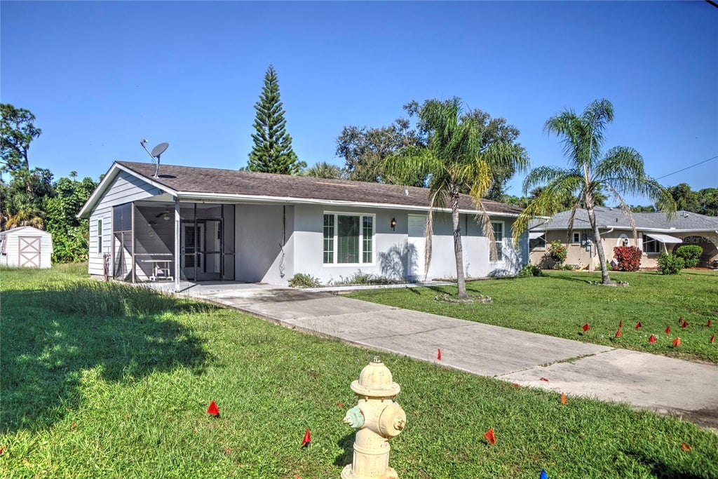 Photo of 493 Dorchester Street, Port Charlotte, FL 33954 (MLS # D6149179)