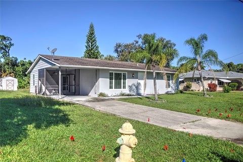 Photo of 493 Dorchester Street, Port Charlotte, FL 33954 (MLS # D6149179)