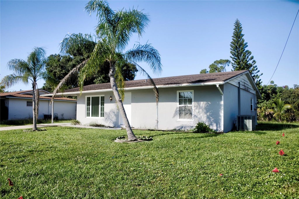 Photo of 493 Dorchester Street, Port Charlotte, FL 33954 (MLS # D6149179)