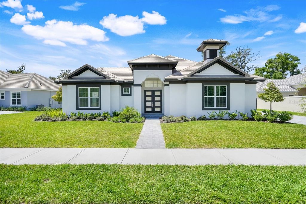 Photo of 138 New Leatherwood Drive, Palm Coast, FL 32137 (MLS # O6409896)