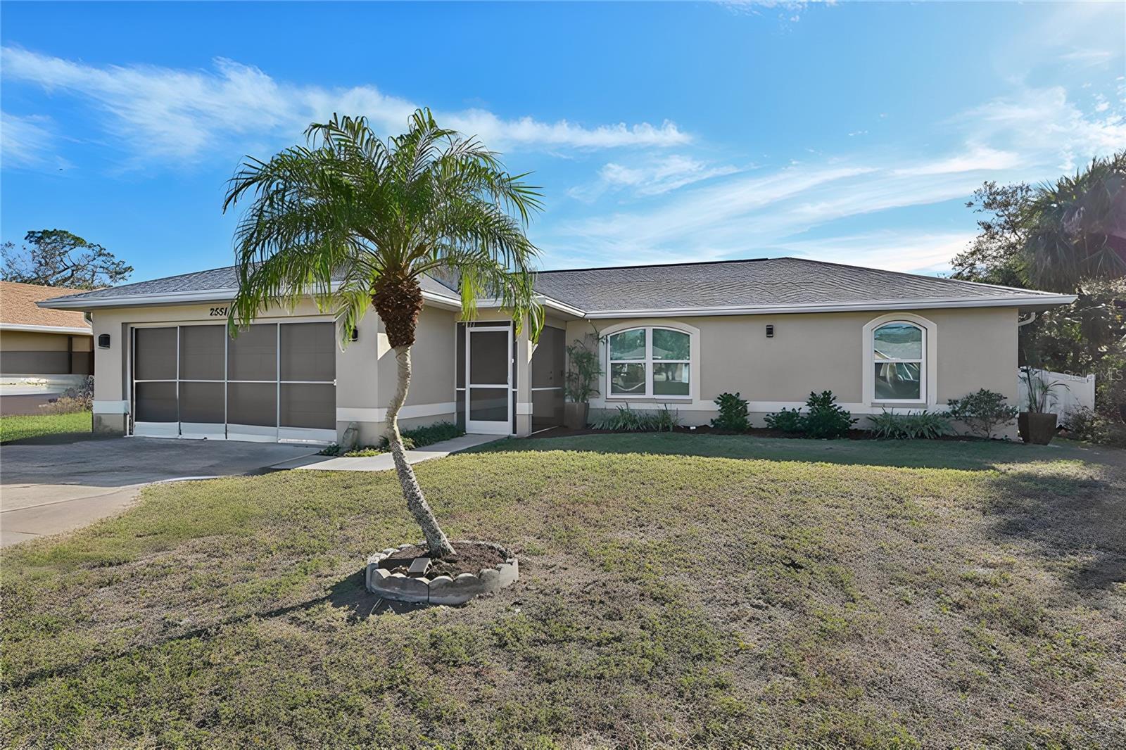 **Double Lot** **New Roof (October 2023)** **Impact Windows (2024)Stunning 3-Bedroom, 2-Bathroom Pool Home on a Spacious Double Lot in North Port, FL Welcome to your dream home! Nestled on a rare double lot in the highly sought-after North Port area, this beautifully updated 3-bedroom, 2-bathroom pool home offers the perfect blend of comfort, style, and space. With nearly 1300 square feet of living space, this charming residence is ideal for both relaxation and entertaining. As you step inside, you’re greeted by a bright and airy open floor plan, featuring vaulted ceilings, large windows, and a seamless flow from room to room. The spacious living area is perfect for family gatherings or cozy nights in, while the well-appointed kitchen boasts modern appliances, ample cabinetry, and a convenient breakfast bar.
The master suite provides a tranquil retreat, complete with a private en-suite bathroom, and two additional generously-sized bedrooms offer plenty of room for family, guests, or a home office. Step outside to your own private paradise! The expansive backyard features a sparkling, screened-in pool and plenty of room to relax or entertain. With the double lot, you have endless possibilities for gardening, playing, or even adding extra features like a fire pit or outdoor kitchen. Situated in a peaceful and friendly neighborhood, this home is conveniently located near parks, schools, shopping, and dining, with easy access to major roadways and Gulf Coast beaches. Don’t miss your chance to own this exceptional property in one of Florida’s most desirable communities. Schedule your showing today and make this North Port gem your own!