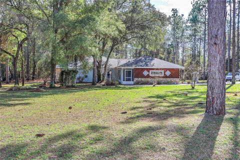 Photo of 18012 SW 68 Loop, Dunnellon, FL 34432 (MLS # OM713446)