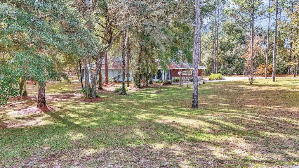 Photo of 18012 SW 68 Loop, Dunnellon, FL 34432 (MLS # OM713446)