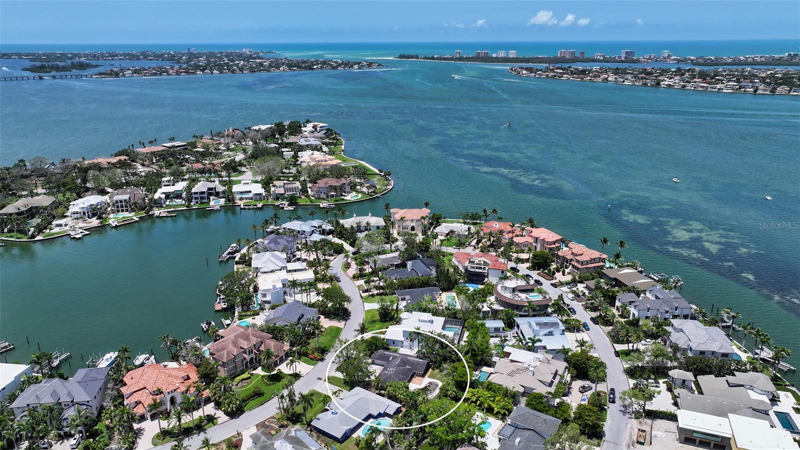 YES! PRICED TO MOVE! Golden Investment Opportunity to Buy a Tear Down House in one of the MOST Sought after Sarasota Neighborhoods! This Lovely Prime "HARBOR ACRES" Gem Located WEST OF THE TRAIL Features: Fantastic Location with Elevated Views of the Bay Across the Street, 14,179 SF Lot, .33 Acres, Public Sewer and Water Hooked-up, Natural Gas Available, Circular Driveway, Room for Pool, Excellent Schools, Close to Morton's Market, Local Restaurants, Shopping, Sarasota Memorial Hospital, Downtown Sarasota, St Armand's plus Easy Access to the Best Florida Beaches! Build Your Custom Custom Home. Hire Our Builder or Bring Your Own! Or Buy your Lot Now and Build Later! Current Home is Being Sold As-Is and was Affected by Storm Damage. Seller has plans for a 5000+SF home for a Modern Farm House or Modern Coastal Style Home that can be built as Custom Construction w/Elevated Water Views!