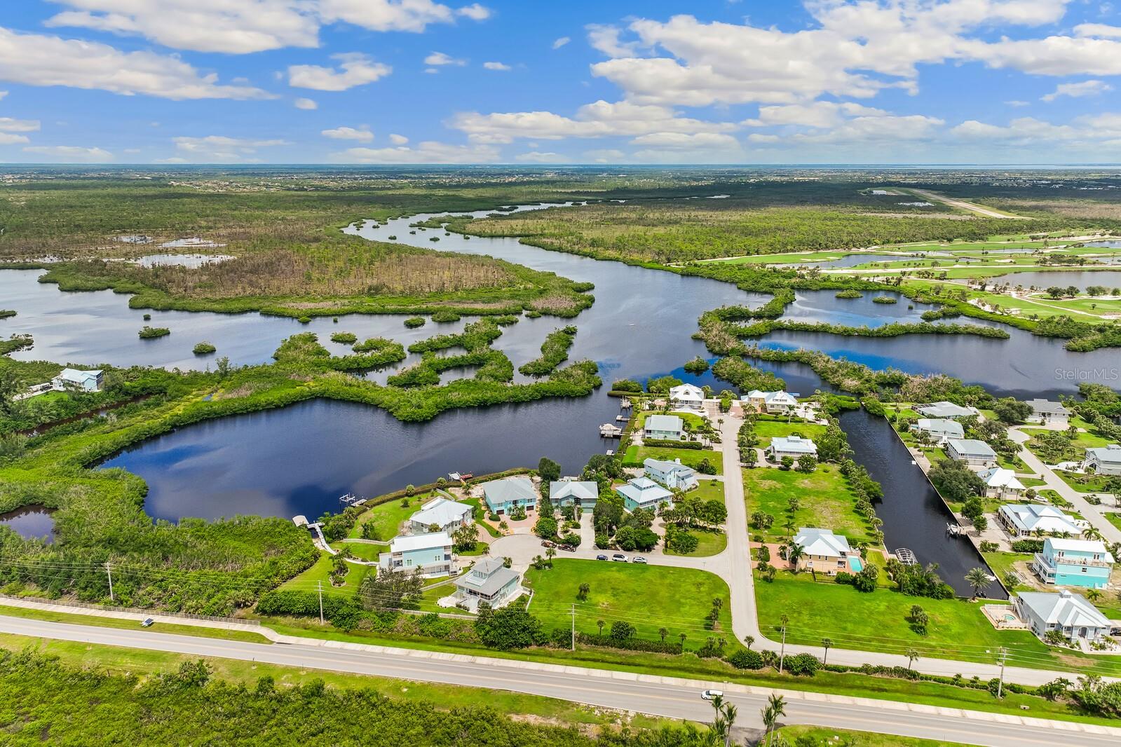 Experience coastal living in Southwest Florida at its finest! This newly updated, elevated home offers sweeping views of Coral Creek, great entertainment spaces, an elevator, all the amenities, and and a water-view master suite. Situated on a spacious 0.35-acre lot, this 3-bed, 2.5-bath home with direct access to the Gulf, offers a mix of relaxation and adventure. Enjoy excellent paddle boarding, kayaking, boating, fishing and bird watching, or simply relax in your private yard with a fire at the waters edge. The home has a new dock and kayak lift, and 65 feet of water frontage. If walking or biking is your thing jump on the Pioneer Trail. Entertain in the gourmet kitchen, or relax with a glass of wine and take in the views, this property has it all. This home is located in a community that provides access to the Placida Harbour Club, which offers boat dockage, a water taxi/ferry to a Private beach, and other amenities such as tennis, pickleball, and a community pool and spa. It also is close to several golf courses, Publix, restaurants, and Boca Grande which is known for its beaches, shopping, and world class fishing. Come take a look, and you will fall in love with life in Southwest Florida!