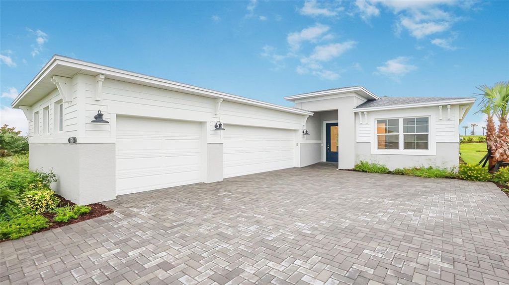 Photo of 1618 Bellagio Loop, Tavares, FL 32778 (MLS # W7880653)