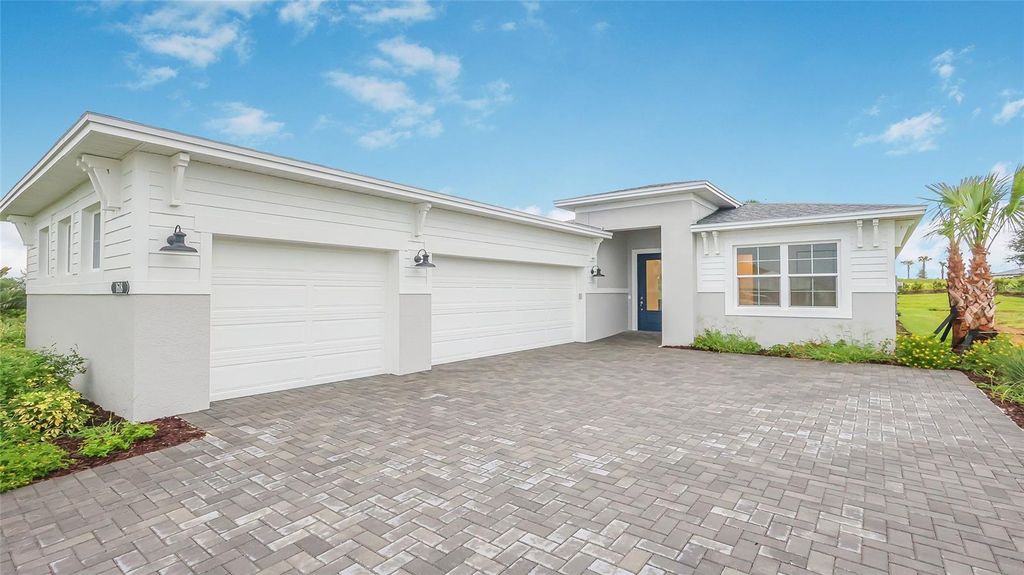 Photo of 1618 Bellagio Loop, Tavares, FL 32778 (MLS # W7880653)