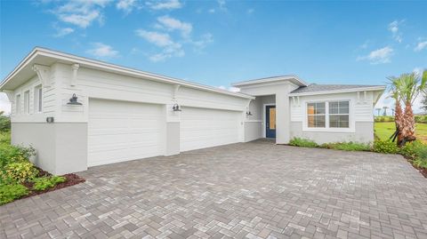 Photo of 1618 Bellagio Loop, Tavares, FL 32778 (MLS # W7880653)