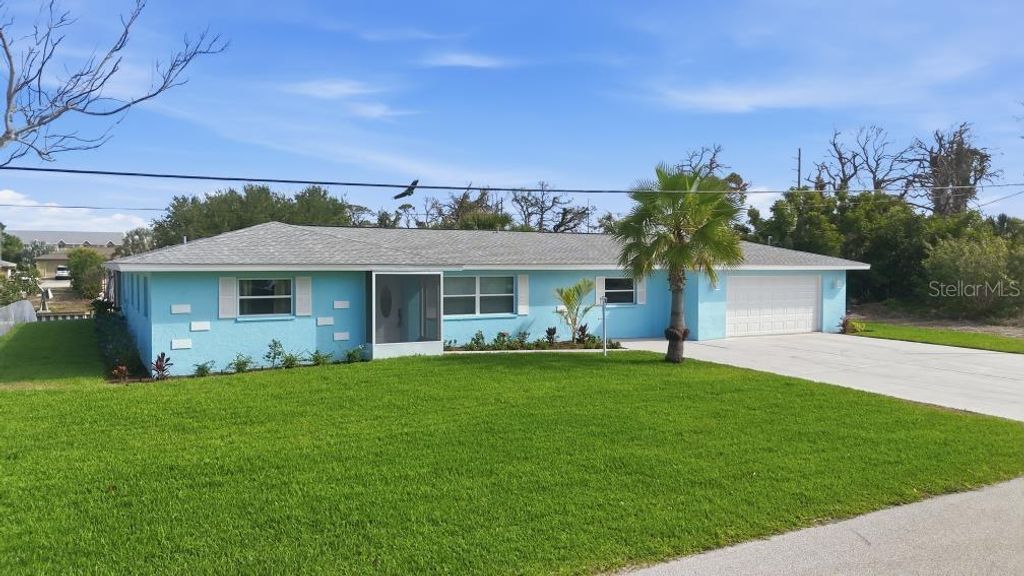 Photo of 1980 Michigan Avenue, Englewood, FL 34224 (MLS # D6147325)