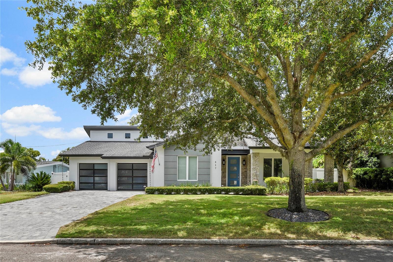 WINTER PARK FIVE BEDROOM POOL HOME - Discover luxurious living in the heart of Winter Park! Crafted with exquisite attention to detail, this 5-bedroom, 4.5-bathroom pool residence showcases absolute perfection and modern elegance. Built in 2018 by David Weekley Homes, the property boasts a captivating stone façade and a private backyard oasis featuring a saltwater, heated pool and spa with water feature, and ambient lighting — an entertainer’s dream.
Inside, soaring ceilings, gleaming wood floors, expansive picture windows, and an abundance of natural light create an inviting and sophisticated atmosphere. The gourmet kitchen is a chef’s paradise, with white maple cabinetry, Quartz countertops, a breakfast island, and stainless-steel gas appliances. The open floor plan seamlessly connects the kitchen, great room, and outdoor living spaces, perfect for hosting friends and family.
Located on the first-floor, the spacious primary suite includes a spa-inspired bathroom, while a dedicated home office and guest suite offer comfort and versatility. Upstairs, discover three additional bedrooms, two full bathrooms, and a versatile loft space. Step outside to the wrap-around porch overlooking meticulously landscaped gardens, creating a serene and private outdoor retreat.
Located just minutes from Park Avenue, Rollins College, and Advent Health Winter Park, this exceptional residence offers convenient access to top shopping, dining, and cultural attractions. Zoned for the highly sought-after Brookshire School District, this is your chance to experience elevated living in one of Winter Park’s most coveted neighborhoods. Schedule your private showing today and make this exquisite property your new home.