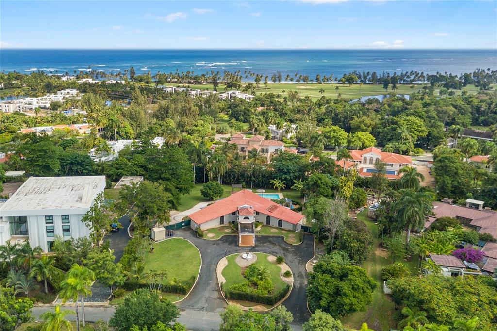 OCEAN VIEWS! Perched on top of a hill, inside the exclusive Dorado Beach Ritz-Carlton Reserve gates, this property will afford you ocean views from every floor, high above the East Beach Ritz-Carlton Residences. This trophy property features 1.25 acres of prime real estate awaiting your personal touch to build an unparalleled estate. Set inside the Dorado Beach Ritz-Carlton Reserve, directly adjacent to the East Beach Ritz-Carlton Residences, The Estates at Dorado Beach consists of 30 custom homes. Each property is set on an oversized lot offering unrivaled privacy, seclusion and flexibility. The Estates is the only community inside the resort where a custom home can be built.
Â
Do not miss out on this rare opportunity to own one of a handful of expansive properties with ocean views inside the Ritz-Carlton Reserve gates. Surrounded by world-class properties valued in excess of $30MM, 9 The Estates at Dorado Beach has an original condition home with 5-bedrooms, 4 full bathrooms, 2 half-bathrooms, a renovated guest house/office/maid’s quarters, new saltwater pool and 100 Kw generator awaiting a new owner to customize this luxury estate.
Â
Schematic architectural plans for a sprawling 10,000 square foot home (7 bedrooms, 8.5 baths, theater, game room, spa, expansive pool, tennis court and gym) are included. Immerse yourself in this tropical paradise centrally located within walking distance of all amenities of The Ritz-Carlton Reserve at Dorado Beach (The Ritz-Carlton Reserve Hotel at Dorado Beach, COA, Positivo, Encanto, Barlovento, Spa Botanico, Golf Clubhouse, Helicopter pad and the TPC East Golf Course) and be pampered by the amenities and premier services provided within the highly sought-after community of Dorado Beach, a Ritz-Carlton Reserve.