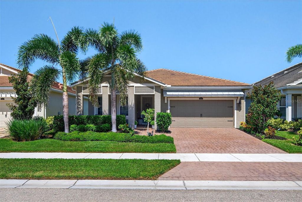 Photo of 5858 Long Shore Loop, Sarasota, FL 34238 (MLS # A4665312)