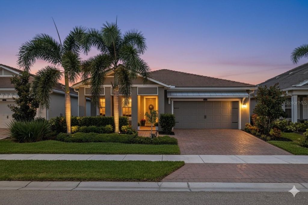 Photo of 5858 Long Shore Loop, Sarasota, FL 34238 (MLS # A4665312)