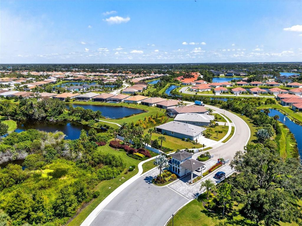 Photo of 5858 Long Shore Loop, Sarasota, FL 34238 (MLS # A4665312)