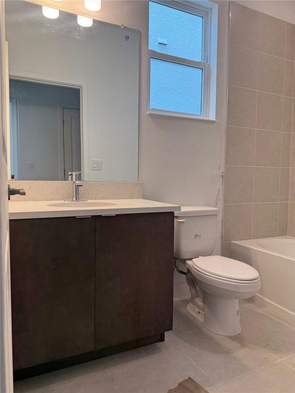 Photo of 2313 W Spruce Street, Tampa, FL 33607 (MLS # TB8405115)