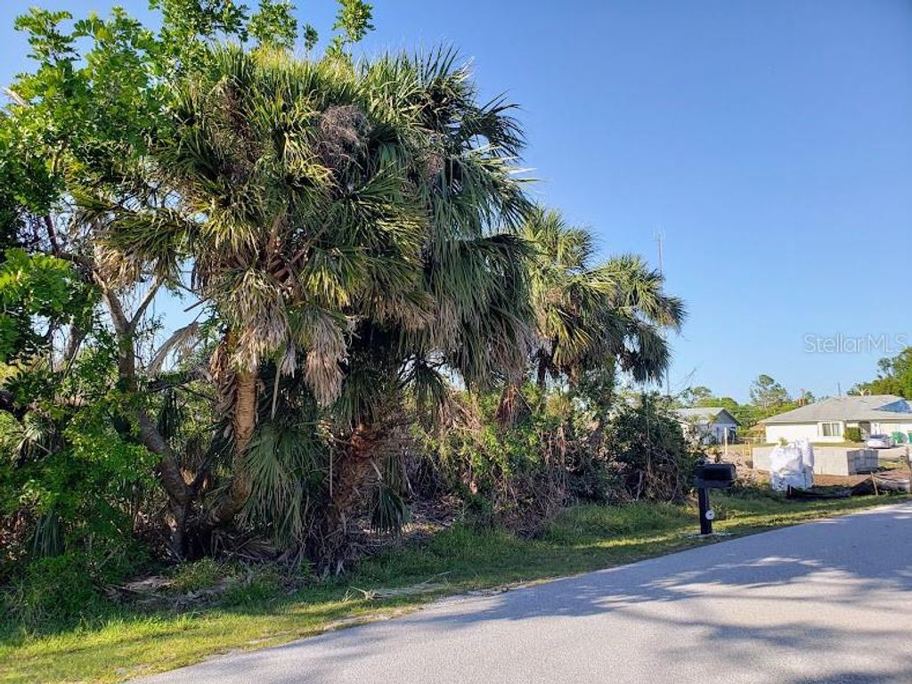 Photo of 928 Tropical Avenue NW, Port Charlotte, FL 33948 (MLS # A4566750)