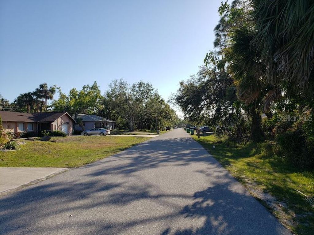 Photo of 928 Tropical Avenue NW, Port Charlotte, FL 33948 (MLS # A4566750)