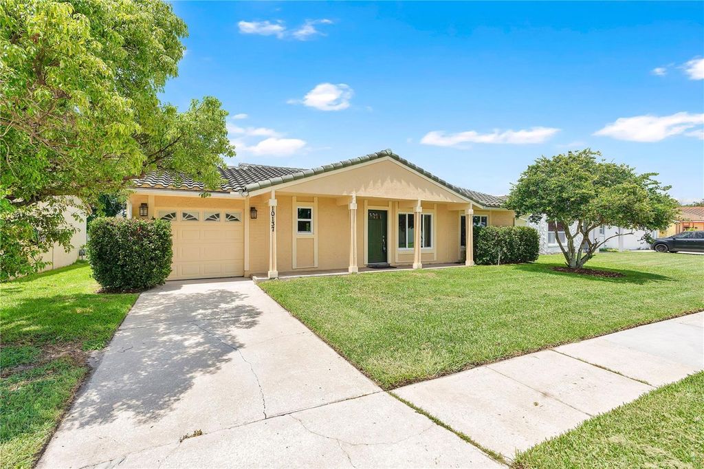 Photo of 10137 Mason Dixon Circle, Orlando, FL 32821 (MLS # O6419401)