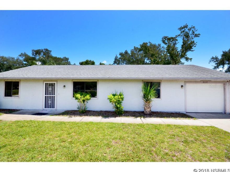 Move-in ready 3-bedroom, 2-bath split plan home with large fenced backyard and water view of a city-owned pond across the street. New interior paint (see virtual tour for updated paint images). Vaulted ceilings make the spacious living room feel even bigger. Master bedroom is also large with his and her closets. 1-car garage is extra deep and has newer door opener. A/C system is newer. Home has irrigation system and pump and hurricane shutters. Tile floors in living room and kitchen. Bedrooms have wood laminate flooring. Centrally located in the heart of Edgewater with nearby restaurants, city parks and boat ramps. ;Water: City