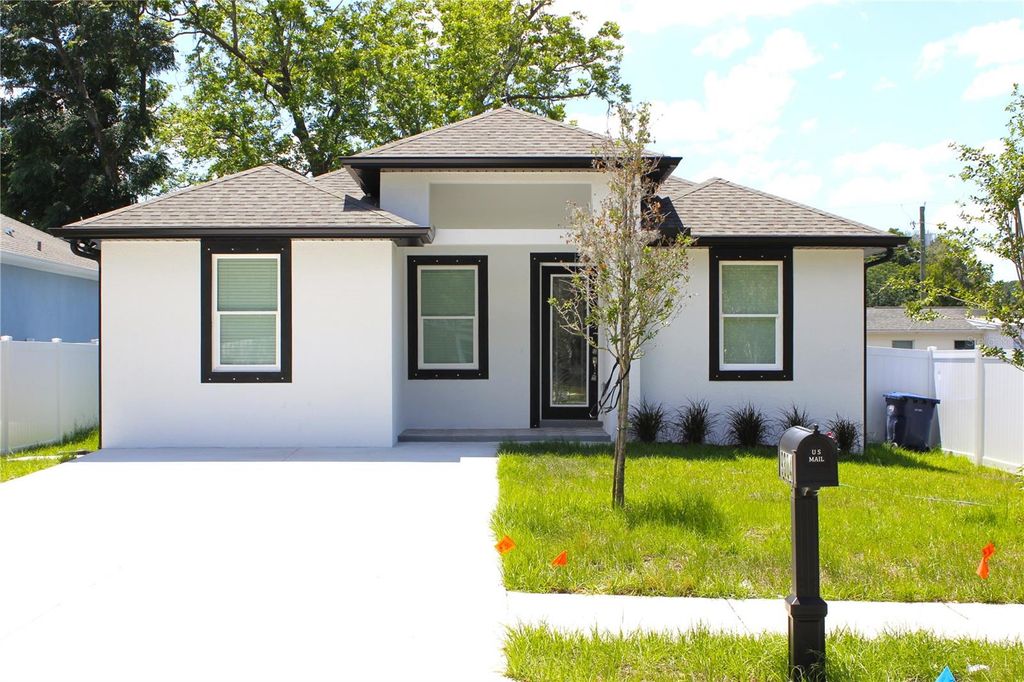 Photo of 9304 N 18th Street, Tampa, FL 33612 (MLS # TB8510063)
