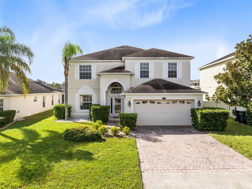 This fully furnished and only used as a vacation home at the desirable community of Providence is a real steal! You will not be able to find more value for your dollars. Step into the elegance and comfort of this 6 bedrooms and and 3 bathrooms home; five bedrooms and laundry room are located on the second floor as well as another bedroom on the first floor that can be used as mother-in-law suite or guest room. The possibilities are endless. The spacious kitchen parades beautiful maple wood cabinets accentuated with granite counter tops, stainless steel appliances with a newer refrigerator and two walk-in pantries. This immaculate house is upgraded with two brand NEW AC units, new pool pump, a new washer and an upgraded sprinkler system. The large Master Bedroom has a private bathroom with twin vanities, garden tub, separate walk-in shower and his and hers walk-in closets. Sit at the inviting lanai and enjoy a breathless view of the pond or enjoy the heated pool and hot tub. The house is located at one of Central Florida's best golf communities. Providence has received the Grand Award for Community Development at the Orlando Parade of Homes for years. Living at this gated community gives residents access to tennis courts, playground, fitness center, activity room, country club with its bar and restaurant, and 2 pools / 25 meter lap pool and resort style pool featuring 2 slides and splash area. Don't miss the chance to call this exquisite home yours!