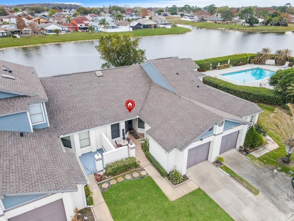 Photo of 62 Lakepointe Circle, Kissimmee, FL 34743 (MLS # O6386858)