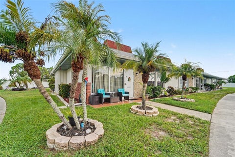 Photo of 4333 Tahitian Gardens Circle #A, Holiday, FL 34691 (MLS # TB8548377)