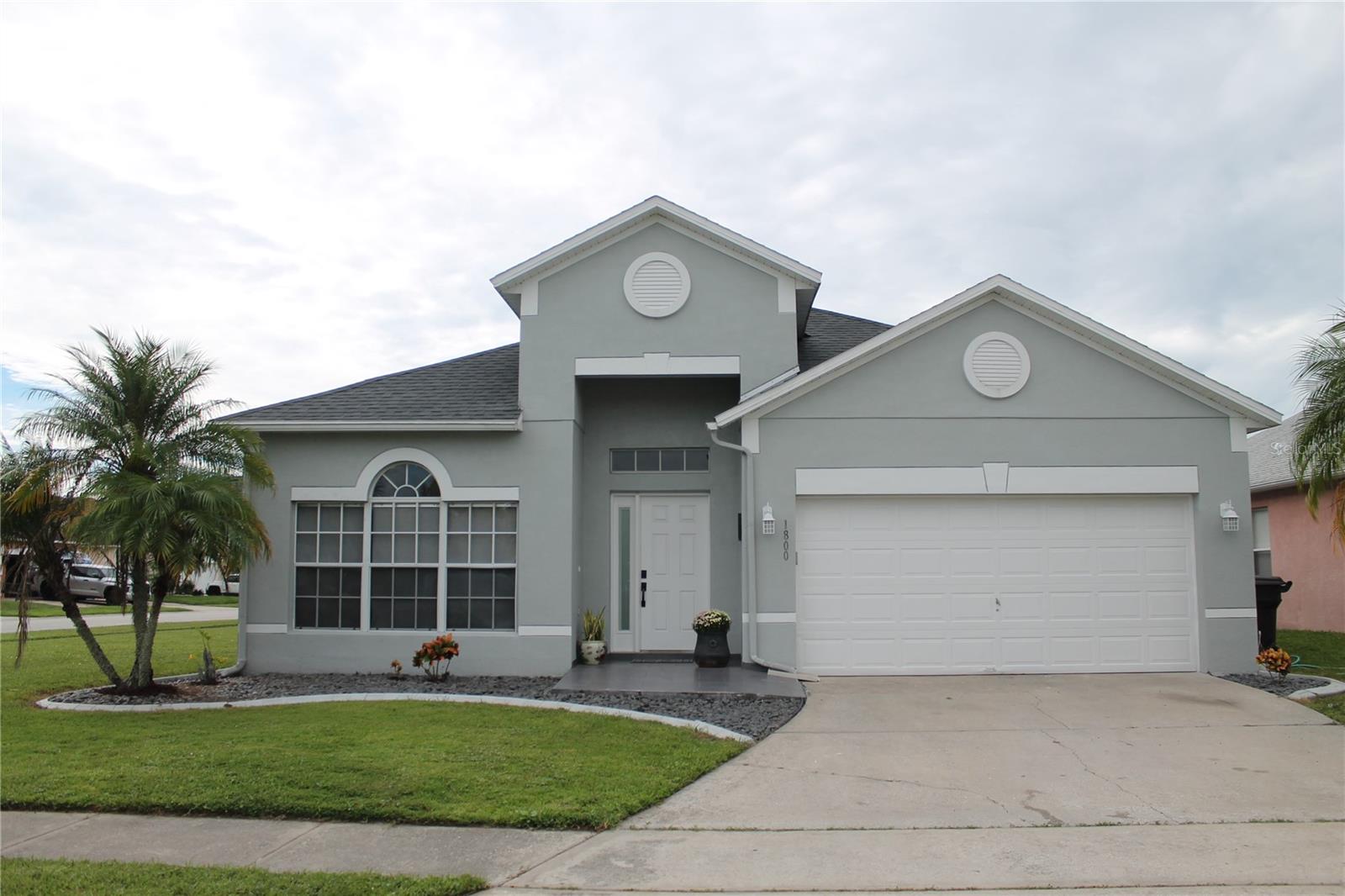Welcome to this beautiful corner-lot single-family home in the heart of Kissimmee! This well-maintained property offers privacy with a fully fenced yard, perfect for family gatherings, pets, or entertaining. Step inside and enjoy a bright, open layout with spacious living areas, a modern kitchen, and a comfortable split-bedroom floor plan. The large master suite provides the perfect retreat, while the additional bedrooms are ideal for family, guests, or a home office.
Outside, you’ll love the curb appeal, palm trees, and ample driveway space with a two-car garage. Located in a central and highly desirable area, this home is just minutes from major highways, shopping centers, restaurants, schools, and world-famous theme parks. Whether you’re commuting, enjoying Florida’s attractions, or relaxing at home, this property offers the perfect balance of convenience and comfort.
Don’t miss the opportunity to own this gem in Kissimmee