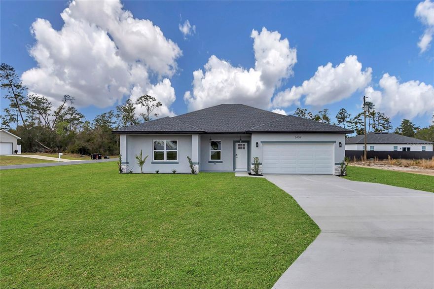 Stunning New Construction Corner Lot Home in Ocala – Modern Comfort & Quality Finishes

Welcome to this beautifully designed brand-new 4-bedroom, 2.5-bath home situated on a desirable corner lot in Ocala, offering extra space, privacy, and excellent curb appeal. Thoughtfully built with quality craftsmanship, this home combines modern style with everyday functionality, making it perfect for comfortable living and entertaining.

The open-concept floor plan features a bright and spacious living area that flows seamlessly into the formal dining space and a well-appointed chef’s kitchen. The kitchen stands out with elegant stone countertops, an abundance of high-quality solid wood cabinetry, and premium appliances, providing both style and convenience from day one.

The home offers generously sized bedrooms designed for comfort and privacy, along with beautifully finished bathrooms featuring modern fixtures and tasteful details. A convenient half bath adds additional functionality for guests and daily use.

Situated on a corner lot, the property benefits from added privacy, more yard space, and enhanced curb appeal. Additional highlights include a 2-car garage, providing secure parking and ample storage.

Perfect for families, first-time buyers, or anyone looking for a move-in-ready home, this property offers modern living in one of Ocala’s growing communities. Schedule your private showing today and come see everything this beautiful home has to provide.
*The seller is offering closing cost assistance.*