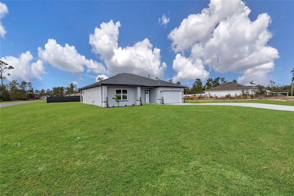 Photo of 2438 SW 156th Loop, Ocala, FL 34473 (MLS # O6388243)