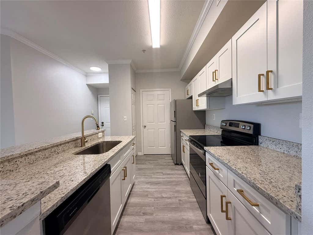 Photo of 5618 Pinnacle Heights Circle #305, Tampa, FL 33624 (MLS # TB8519115)