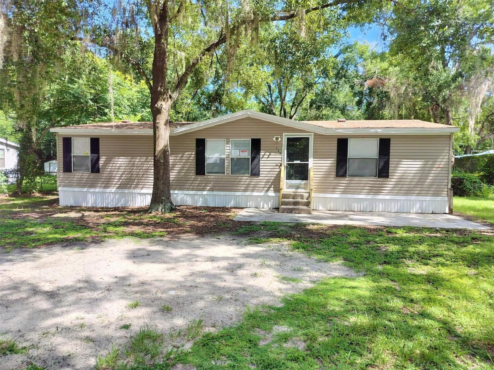 Move-in ready 3 bedroom, 2 bath home on a shaded 1/3-acre lot is waiting for a new owner. The kitchen features NEW granite countertops, fixtures, lighting and newer black appliances. NEW easy care Luxury Vinyl Plank flooring throughout and a fresh coat of paint! Roof only 4 years old, Septic system only 2 years old and Hot Water heater is new. Enjoy the spacious backyard with ample room for your 'extras' think RV, Boat, or outdoor kitchen. Bring it all!
